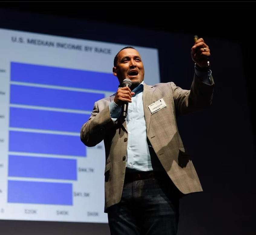 LaRese Purnell speaking at a financial literacy event